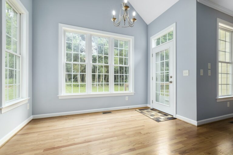 Light Blue Wall with White Framed Windows